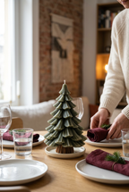 Evergreen candle as an effortless Christmas table centerpiece